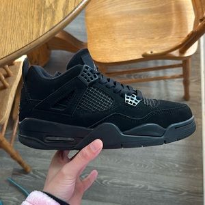 Black Cat Jordan 4s